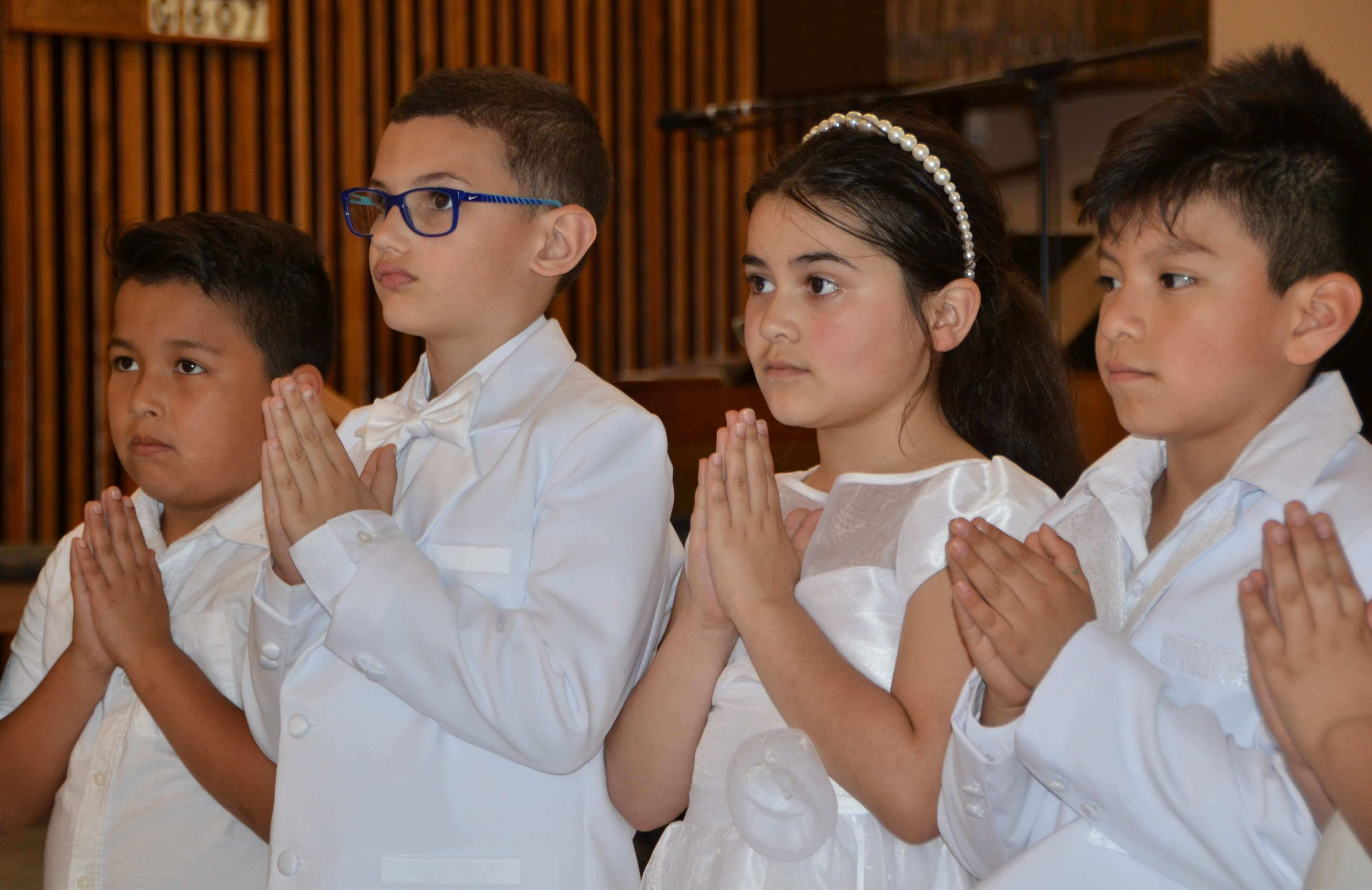 Four Kids Praying in Chapel