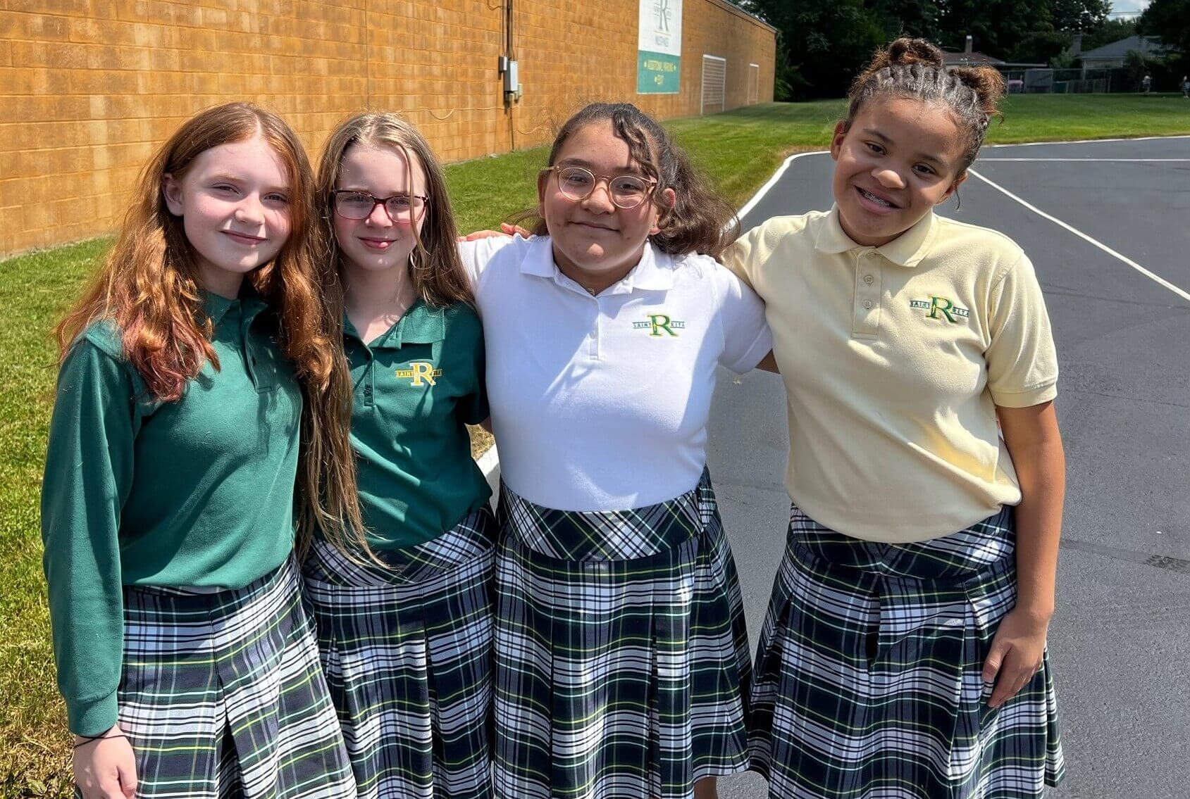 Four Students Posed on Playground