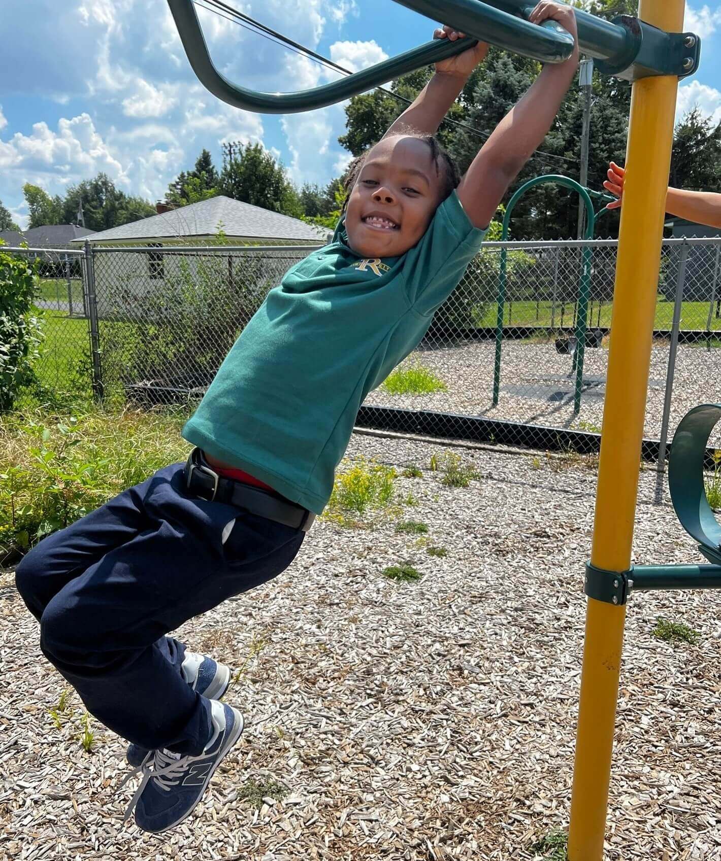 Kid Playing on Playground