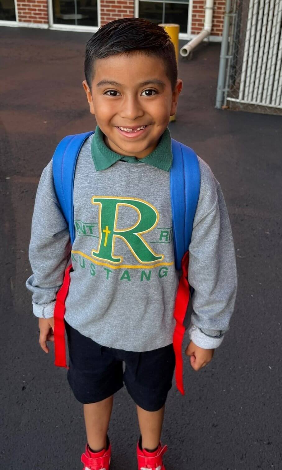 Smiling Student with Backpack